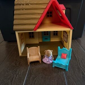 Li'l Woodzeez Sunny Acres Country House playset with accessories.
